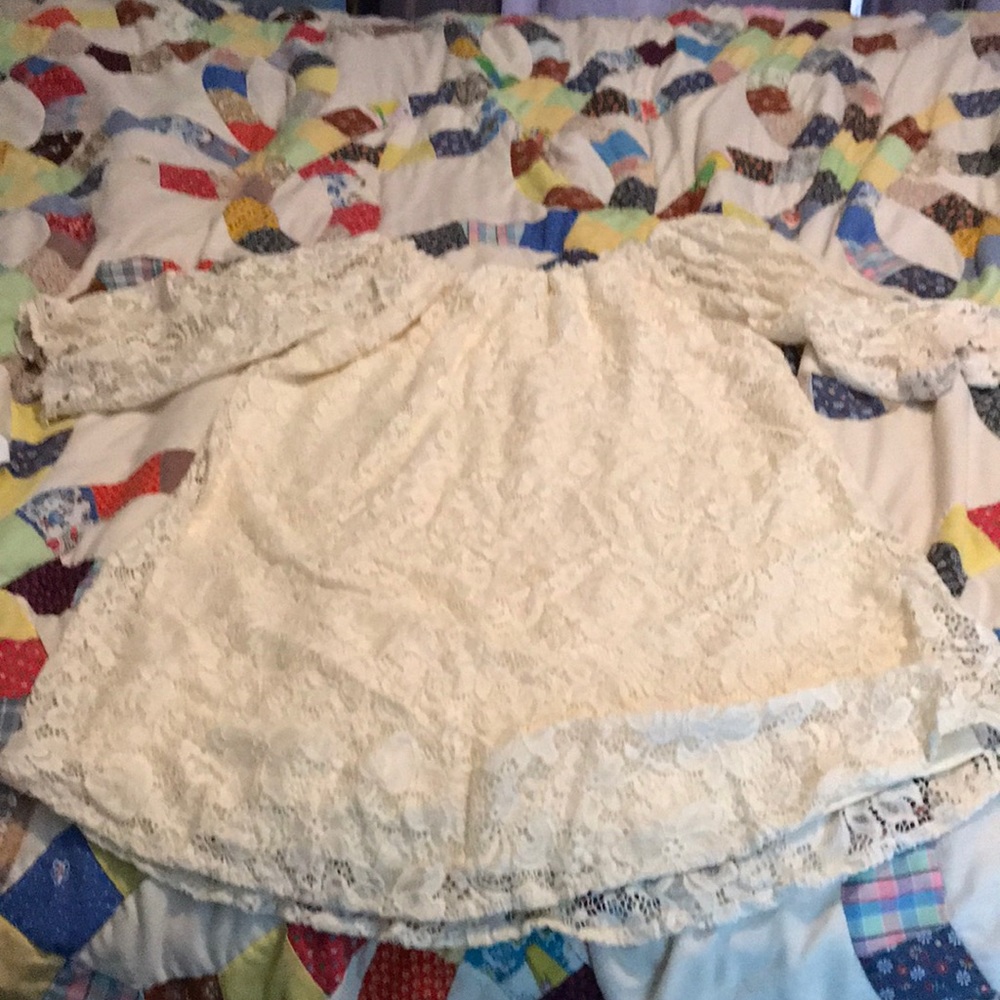White or cream colored Lacey short dress